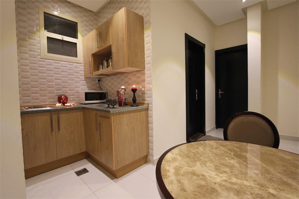Taleen Granada Hotel Apartments Riade Quarto foto